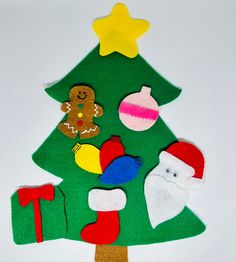 a felt christmas tree with decorations on it