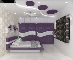 a bedroom with purple and white decor in the ceiling, walls and bed area is shown