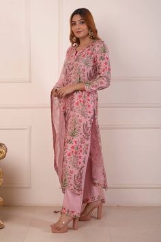 Peach straight kurta with digital floral print all over and aari work. Paired with a matching palazzo and chanderi dupatta.
Components: 3
Pattern: Printed
Type Of Work: Digital print
Neckline: Notched
Sleeve Type: Three-quarter
Fabric: Kurta and Palazzo: Cotton Silk, Dupatta: Chanderi
Color: Peach
Other Details: 
Length:
Kurta: 47 inches
Palazzo: 38 inches
Dupatta: 2.5 mtrs
Occasion: Puja - Aza Fashions Kurta And Palazzo, Chanderi Dupatta, Floral Set, Straight Kurta, Aari Work, Silk Dupatta, Set For Women, Cotton Silk, Aza Fashion