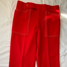 These Are Amazing Vintage Pants From The 60s And 70s. Unique White Stitching. Excellent Vintage Condition, Looks Like They Were Never Worn. Bought At A Vintage Shop And Sadly They Don’t Fit Me. Waist 15 Inches, Rise 12 Inches Retro Red Bottoms For Spring, Retro Fitted Red Pants, Vintage Red Pants With Pockets, Vintage Red Wide Leg Pants, Retro Red High-waisted Pants, Retro Red Trousers, Retro Red Workwear Bottoms, Retro Red Bottoms For Workwear, Retro Red Bottoms For Work