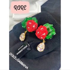 Authentic Dolce & Gabbana Couture Rare Red Floral Clip-On Earrings Crafted From Red & Green Enamel And Gold Toned Clip-On Backs With Clear Swarovski Crystals Throughout The Flowers. They Are New With Tags, But One Does Have A Small Chip. Please Observe Photos. They Are A Bit Larger Than A Quarter And More Stunning In Person. Offers Welcome Luxury Red Earrings For Party, Luxury Red Party Earrings, Designer Red Earrings For Formal Occasions, Designer Red Earrings For Gifts, Designer Red Jewelry For Party, Dolce & Gabbana Couture, Dolce Gabbana Jewelry, Dolce And Gabbana Earrings, Dog Earrings