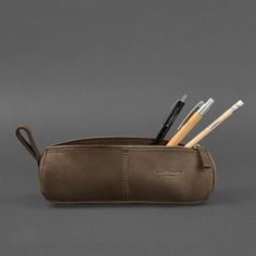 A leather pencil case-cosmetic bag is a versatile accessory that can be used to store any small items. Such an accessory will be good as a pencil case, glasses case, organizer for hygiene items, and other small things. The cosmetic bag is made of high-quality natural leather. This leather is incredibly soft and durable. The inner surface has a velvety, well-finished texture, so there is no need to make a lining. The pencil case-cosmetic bag is closed with a metal zipper. There is a leather loop Classic Rectangular Pencil Case For Everyday Use, Classic Pencil Case With Pen Slots, Classic Rectangular Pencil Case, Leather Pencil Case Pouch For Personal Use, Leather Pencil Case For Everyday Use, Leather Portable Pencil Case For Everyday Use, Portable Leather Pencil Case For Everyday Use, Modern Leather Pencil Case For Daily Use, Modern Leather Pencil Case For Travel