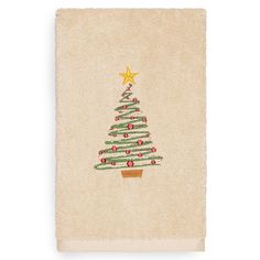 a white towel with a christmas tree on it