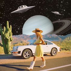 a woman walking across a road next to a car and a giant white object in the sky