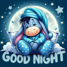 a blue stuffed animal sitting on top of a cloud with the words good night written below it