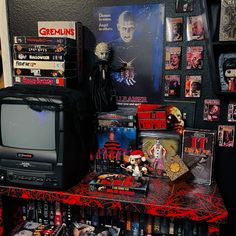 a collection of horror movie memorabilia on a table