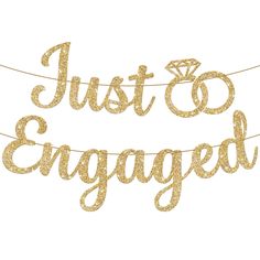 just engaged banner with gold glitter lettering