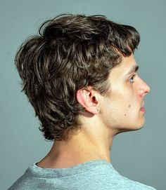 Modern Mod Mullet Ceasar Haircut Men, Men’s Edgy Haircut, Modern Mod Haircut Men, Short Scruffy Hair Men, 90s Mens Haircut, Mens Mod Haircut, Short Haircuts For Men With Wavy Hair, 60s Mod Haircut, Mid Length Curly Hair Men