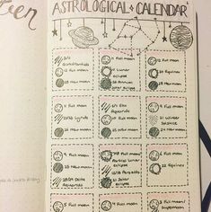 an astrological calendar is shown on a notebook