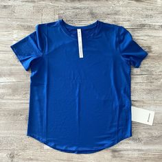 Lululemon High Neck Running and Training T-Shirt Women's Size 6 Symphony Blue NWT *NWT *Size 6 *Symphony Blue *Smoke and pet free home *I ship same day/next day Lululemon Go-dry Short Sleeve T-shirt, Lululemon Stretch Short Sleeve T-shirt, Lululemon Stretch T-shirt With Short Sleeves, Lululemon Casual Stretch T-shirt, Lululemon Stretch Crew Neck T-shirt, Lululemon Casual T-shirt For Gym, Lululemon Sporty Short Sleeve T-shirt, Lululemon Relaxed Fit T-shirt, Lululemon Relaxed Fit Short Sleeve T-shirt