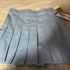 Brand New Pleated Blue Tennis Skirt Great Condition Blue Pleated Skirt For School In Spring, Blue Pleated Tennis Skirt For School, Blue Pleated Mini Tennis Skirt, Blue Pleated Skort For School, Blue Pleated Skort Fitted, Blue Pleated Skirt For School, Casual Blue Pleated Tennis Skirt, Blue Pleated Fitted Skort, High Waist Light Blue Lined Mini Skirt