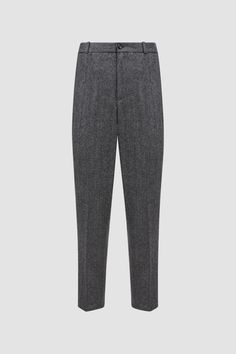 Boasting a soft yet resistant finish, these pants are crafted from a wool and nylon blend. The slacks feature a herringbone pattern in a nod to sartorial elegance. Creating a sophisticated cold weather look, they layer perfectly with a matching puffer. Classic Winter Pants With Welt Pockets, Classic Winter Pants With Belt Loops, Classic Wool Dress Pants For Winter, Tailored Winter Pants With Straight Hem, Formal Wool Pants With Herringbone Pattern, Tailored Pants With Straight Hem For Winter, Formal Winter Trousers Pants, Formal Winter Trousers, Tailored Wool Bottoms For Winter