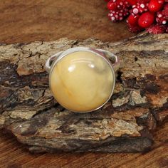 SDR-1609 Description : Gemstone : Yellow Aventurine Color : Yellow Stone Size : 16 X 16 MM Approx Stone Shape :- Round Stamp :- 925 Metal : 925 Sterling Silver Weight : 4.39 Gram Approx Handmade Item Made to order This Ring is made to Order. Processing Time :- This is handmade item and we need 3-5 days to ship your order . Yellow Aventurine Metaphysical Properties: Use Aventurine to reduce/absorb/protect against electromagnetic and environmental pollution. Yellow Aventurine can assist in removin Amber Rings With Natural Stones For Gift, Gift Rings With Amber Natural Stones, Gift Amber Rings With Natural Stones, Amber Rings With Natural Stones, Round Opal Ring With Natural Inclusions As Gift, Round Opal Ring With Natural Inclusions For Gift, Untreated Round Opal Ring For Gift, Untreated Round Opal Ring As Gift, Untreated Round Opal Ring As A Gift