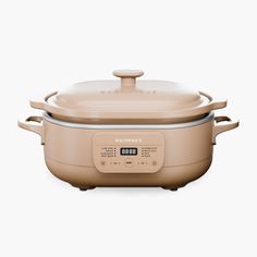 the crock pot with lid is shown in front of a white background and has an electronic