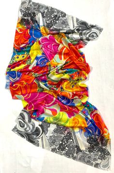 "Embrace and enjoy the everlasting elegance of this pure silk  Designer Shawl. Wrap it around and feel luxurious.   This is a stunning Silk wrap shawl in bright and multicolour  modern floral pattern  with black lace pattern at two ends on natural silk base skilfully woven and digitally printed.  This shawls look amazing in evening light, giving off a rich glow and lustre. This shawl can be paired with any top, blouse, dress, or any other thing, no doubt you'll stand out from the crowd.  This De Luxury Modern Multicolor Tops, Luxury Multicolor Elegant Tops, Black Lace Pattern, Modern Floral Pattern, Designer Shawl, Evening Light, Blue Party Dress, Silk Shawl, Girls Dresses Summer