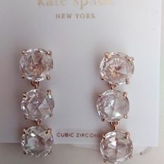 3 3/8" Cubic Zirconia, Each Set With 4 Gold Prongs And Joined By Gold Chain. Drop Is 1-3/8". Studs. Gold Fixings. Retail - $68. Nwt Kate Spade Silver Wedding Jewelry, Silver Kate Spade Earrings Gift, Kate Spade Drop Earrings For Formal Occasions, Kate Spade Wedding Earrings, Kate Spade Formal Jewelry With Matching Earrings, Kate Spade Formal Drop Earrings, Kate Spade White Round Jewelry, White Kate Spade Jewelry, Kate Spade Drop Earrings For Party