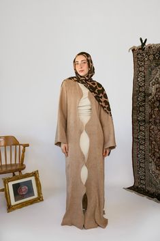 From running to the mosque, to celebrating Eid and #abayaFridays, our flowing abayas add just what you need to elevate any look. Dimensional texture and a curving detail gives this abaya a unique touch you won’t find anywhere else. Now in a timeless tan with gold undertones. Complete the look with our black or beige layering dress or rock it alone. Pairs with Moonrise Oak Mariam M/L 5’7 Tall (was wearing 2 inch kitten heels) Sarah 5’4 M/L Standard (was wearing flats) Wafaa 5’1 XS/S Short (was we Hijab Colors, Abaya Black, Grey Sweats, Instant Hijab, Layer Dress, Abaya Fashion, Silk Chiffon, Pretty Colours, Muslim Fashion