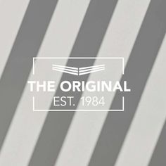 the logo for the original est, 1934 is shown on a striped background with white and gray stripes