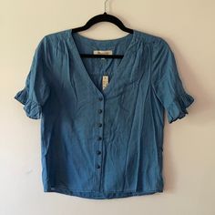 Madewell Blouse, New With Tags. Button Down In Light Breezy Cotton Fabric With Ruffled Sleeves, Perfect For Warm Weather! Size Xx-Small, Runs Large - Will Fit X-Small Or Small Well. Soft, Light Material. Purchased New From Store And Never Worn. Madewell Top, Ruffled Sleeves, Soft Light, Warm Weather, Madewell, Cotton Fabric, Top Blouse, Womens Tops, Tags