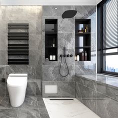 a bathroom with grey marble walls and floor