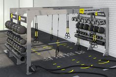 the gym is equipped with equipment for strength training and weight - lifting machines, as well as an overhead pull up bar