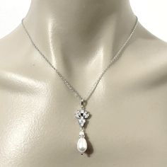 "A set of pearl drop bridal jewelry set with marquise earrings and teardrop necklace, made of sparkly cubic zirconia and swarovski pearls in silver rhodium plated tarnish-resistant base. Earrings are about 1 3/8\" (3.6cm). Pendant is about 1 3/4\" (4.5cm) with bail. Chain length can be added with a 2\" extender chain. View matching pieces or similar designs at https://etsy.me/2uIu6QL View designs with marquise shapes at https://etsy.me/2flzzGg View all necklace and earrings sets at https://etsy. Marquise Bridal, Marquise Earrings, Earrings Sets, Crystal Earrings Wedding, Bridal Earrings Drop, Bridal Jewelry Set, Cubic Zirconia Jewelry, Vintage Style Wedding, Teardrop Necklace