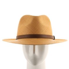 ↑ Click above to watch the video! ↑ Malta Sienna is a modern fedora with a tall hand-blocked teardrop crown that features a stiffened medium brim, sleek leather strap hatband, and beautiful sienna-colored straw. The brim contains a wire to hold its shape. This item is a genuine Panama Hat handwoven in Ecuador. Material: 100% Toquilla StrawBrim: 2 3/4"Crown: 4 1/2" teardropHatband: 5/8" leatherClimate: Sun Handwoven in Ecuador. Hand-finished in the US. Measurements are approximate, this is a hand Adjustable Curved Brim Hat With Leather Lining, Adjustable Hat With Leather Lining And Curved Brim, Luxury Flat Brim Fedora For Spring, Modern Fedora With Short Brim For Everyday, Everyday Leather Fedora With Curved Brim, Modern Adjustable Brimmed Fedora, Classic Leather Fedora With Flat Brim, Brown Curved Brim Hat With Leather Lining, Adjustable Leather Fedora With Short Brim