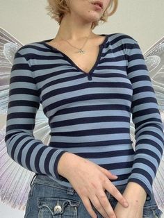 ⚡Buy 2024 Kawaii Stripe Long Sleeve Tee Blue M under $17.00 in Tops&Tees at AnotherChill.com Online. Style: Casual/Street/Y2K/Preppy/Vintage/Sweet. Fabric Content: Polyester Blend. Fit Type: Regular fit. Neckline: V Neck. Sleeve Length: Long Sleeve. : Elevate your wardrobe with this trendy striped V neck tee. Its casual yet preppy design and vintage y2k vibes make it perfect for any occasion.. ✓2024 S/S OUTFITS. Check reviews and buy Striped V Neck Long Sleeve Tee today. Vintage Y2k Outfits, Street Y2k, Striped Shirts, Preppy Vintage, Pattern Simple, Y2k Preppy, Striped Long Sleeve Tee, Logo Vintage, Estilo Preppy