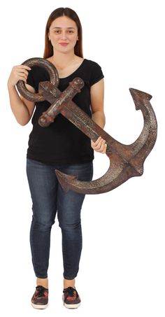 a woman is holding an anchor and wrench