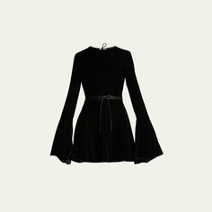 Saint Laurent velvet dress Jewel neckline; self-tie open back Long flare sleeves Mini length A-line silhouette Viscose/silk Made in Italy Skater Mini Dress, Flare Sleeves, Mini Skater Dress, Jewel Neckline, Velvet Dress, Flared Sleeves, Open Back, Saint Laurent, Tops Designs