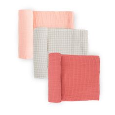 four napkins in different colors and patterns