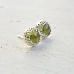 Peridot earrings,peridot studs,gemstone earrings,august birthstone,silver earrings,green earringsSterling silver stud earrings with 6 mm natural peridot stone.Dainty and delicate earrings.Perfect for everyday, simple but classic.Amazing look, no one will miss!!*Made from sterling silver stud earrings. *Stone size - 6mm.All my jewelry are packed in an elegant gift box.If you want to give it as a gift you can specify the address and I'll be happy to send it on your behalf.To see more, please visit Dainty Green Sterling Silver Earrings, Peridot Earrings In Lime Green As A Gift, Peridot Earrings For May Birthstone Gift, Peridot Lime Green Earrings As Gift, Peridot Lime Green Earrings For Gift, Lime Green Peridot Earrings As Gift, Lime Green Sterling Silver Earrings For Gift, Gift Lime Green Sterling Silver Earrings, Earrings Stone