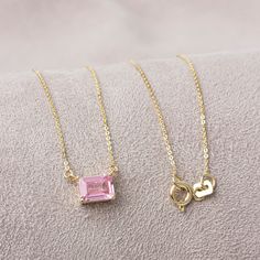 "Tourmaline is a stone of protection and grounding. It is a symbol of balance and harmony. Our 14k solid gold and pink tourmailine necklace is produced horizontally with double link to stay fixed on your neck with its special design. A stylish jewel for you and your loved ones. Time to pamper yourself and your loved ones... Pink Tourmailine is the birthstone of October. 🤍🤍 Special gifts for your special moments. We produce our jewelery for you in the most perfect way. 🤍🤍 All of our products Pink Rectangular Stone Jewelry For Gift, Spiritual Gemstone Necklace With Rectangular Pendant, Spiritual Rectangular Pendant Gemstone Necklace, Gift Natural Stone Rectangular Necklace, Rose Gold Jewelry With Rectangular Stone For Gift, Rectangular Birthstone Necklaces For Gifts, Rectangular Birthstone Necklace For Gift, Rectangular Gemstone Spiritual Jewelry, Pink Square Jewelry For Gifts