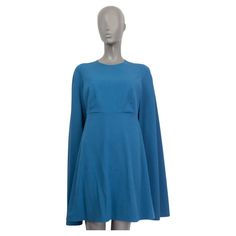 100% authentic Valentino cape cocktail dress in petrol wool (100%). Opens with a concealed zipper on the back and one button on the back. Lined in blue silk (100%). Has been worn and is in excellent condition. Measurements Tag Size 42 Size M Shoulder Width 36cm (14in) Bust 78cm (30.4in) to 86cm (33.5in) Waist 74cm (28.9in) to 78cm (30.4in) Hips 100cm (39in) to 108cm (42.1in) Length 90cm (35.1in) All our listings include only the listed item unless otherwise specified in the description above. Valentino Cape, Vintage Valentino, Valentino Dress, Wool Cape, Petrol Blue, Cape Dress, Red Carpet Looks, Blue Silk, Blue Wool