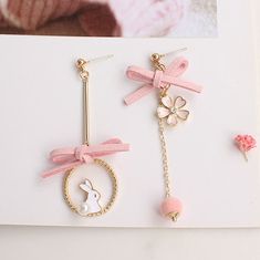 Kawaii Rabbit Sakura Earrings/Clips PN3858 ●Material: Alloy ●Size:please check our picture. ●About Shipping: We attach great importance to the orders of each customer and parcel delivery. 1.Processing time: 2-3 business days. 2.Shipping time: 10-15 business days to US, please allow 3-4 weeks shipping to other country.(Shipping times can be affected by variable customs clearance times or public holidays.) Cute Pink Hoop Earrings For Gift, Cute Drop Clip-on Earrings For Gift, Adjustable Kawaii Dangle Earrings, Cute Clip-on Earrings As A Gift, Cute Adjustable Clip-on Earrings As Gift, Cute Pink Clip-on Earrings For Gift, Cute Gold Earrings For Spring, Cute Handmade Pink Hoop Earrings, Cute Clip-on Drop Earrings For Gift