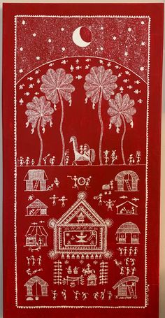 a red bandanna with white designs on it and stars, trees, and houses