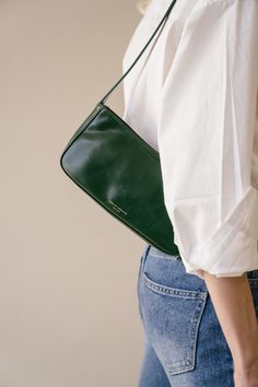 Meet a petite, on-the-go edition of our best-loved baguette bag. An easy-to-carry little number at a perfectly accessible price point. Vegan Leather Zip at top Lined Shoulder bag with golden-tone hardware Length 24.5cm, Width:4.5cm, Height 11.5cm Weight:200g Shipping & Return Free US shipping on orders over $100.Free International shipping on orders over $300. For more details click HERE. Luxury Olive Shoulder Bag With Removable Pouch, Affordable Everyday Baguette Satchel Bag, Luxury Olive Shoulder Bag For Women, Cheap Everyday Green Hobo Bag, Luxury Everyday Olive Bag, Luxury Soft Leather Green Shoulder Bag, Cheap Classic Baguette Bag For Everyday, Luxury Leather Baguette Bag With Single Compartment, Luxury Leather Baguette Flap Bag