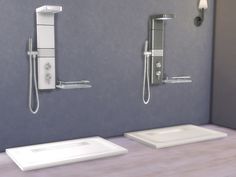 there are two shower heads on the wall