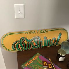 there is a skateboard and other items on the table