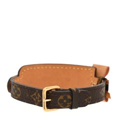 This is an authentic LOUIS VUITTON Monogram Address Wish Bracelet. This stylish bracelet is an ode to traditional travel pieces, yet with a feminine appeal. This unique accessory is crafted of vachetta leather with a surface of traditional Louis Vuitton monogram canvas. The bracelet features a vachetta bow and a snap compartment with a brass buckle, similar to what is found on a luggage ID tag. Stylish Bracelet, Wish Bracelets, Brass Buckle, Id Tag, Accessories Unique, Monogram Canvas, Authentic Louis Vuitton, Louis Vuitton Monogram, Monogram