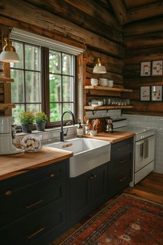 a kitchen with wooden walls and flooring next to a window filled with potted plants