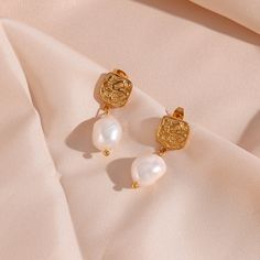 Elevate your personal style with these fabulous 18K Gold Baroque Freshwater Pearl Drop Earrings. Crafted with 18K gold plated - stainless steel, these exquisite pearl earrings will make you shine! The Freshwater Pearl Baroque design exudes timeless sophistication and beauty. Latest Earrings Design, Pearl Baroque, Stud Drop Earrings, Droplet Earrings, Bamboo Hoop Earrings, Freshwater Pearl Drop Earrings, Gold Baroque, Baroque Design, Gold Pearl Earrings