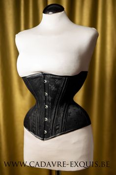 Underbust Corset - Flower coutil Beautiful underbust corset, made from the finest flower coutil. This corset is perfect to be worn both over or underneath clothing. Thanks to the external boning channels, the boning channels will not press directly on the skin. The one layer construction and sturdy flower broche coutil (unique corset fabric) permit the skin to breath and allow the corset to set itself to your body. The silver busk and grommets give the corset an elegant and classic touch. Charac Overbust Corset With Boning And Fitted Bodice, Underbust Corset With Boned Bodice, Underbust Corset Dress With Boning And Fitted Bodice, Fitted Underbust Corset With Medium Bust Support, Elegant Underbust Corset With Medium Bust Support, Fitted Underbust Bodice With Medium Bust Support, Elegant Overbust Corset Belt With Boning, Elegant Overbust Corset Belt With Boned Bodice, Elegant Corset With Medium Bust Support