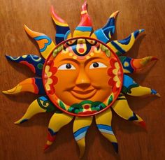 a sun face is shown on the wall