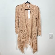 Chico's Artisan Fringe Sloane Cardigan Sweater 3/4 Sleeve Blush Size:2 New With Tags Measurements Chest: 19" Sleeve: 24 Length: 27" Capture The Beauty Of Boho In The Open-Weave Poncho And Trimmed With Fabulously Long Fringe. Perfect Spring Time Cardigan Sweater For Those Evenings Out. #253 Spring Open Knit Long Cardigan, Spring Long Open Knit Cardigan, Beige Long Sleeve Sweater For Summer, Spring Cream Open Knit Outerwear, Cream Open Front Sweater For Spring, Long Beige Spring Cardigan, Spring Open Knit Long Sleeve Cardigan, Long Beige Cardigan For Spring, Beige Long Cardigan For Spring