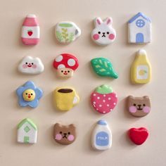 there are many small toy magnets on the wall