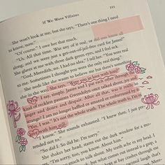 an open book with pink and red writing on the page, it is written in english