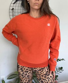 "Vintage Champion Sweatshirt, crew neck. Lived in feel. Orange Label: Champion  Tag Size: Small Fabric: Cotton Condition: Excellent vintage condition Specific measurements taken upon request.  For reference, model is 5'4\" wears a S/M and a modern size 4 Miami Vintage Company takes requests! Our collection is too large to list its entirety. Feel free to message us with items you are interested in. We are happy to pull pieces you are seeking for special events, photoshoots, and performances.  SAT Miami Vintage, Womens Sweatshirts, Champion Crewneck, Sweatshirt Outfit, Champion Sweatshirt, Vintage Champion, Mini Shirt Dress, Graphic Tee Shirts, Burnt Orange