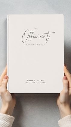 two hands holding up a book with the title, the offbeatt by charles wilson