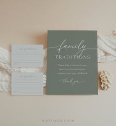 the wedding stationery is laid out on top of each other, including a card and envelope